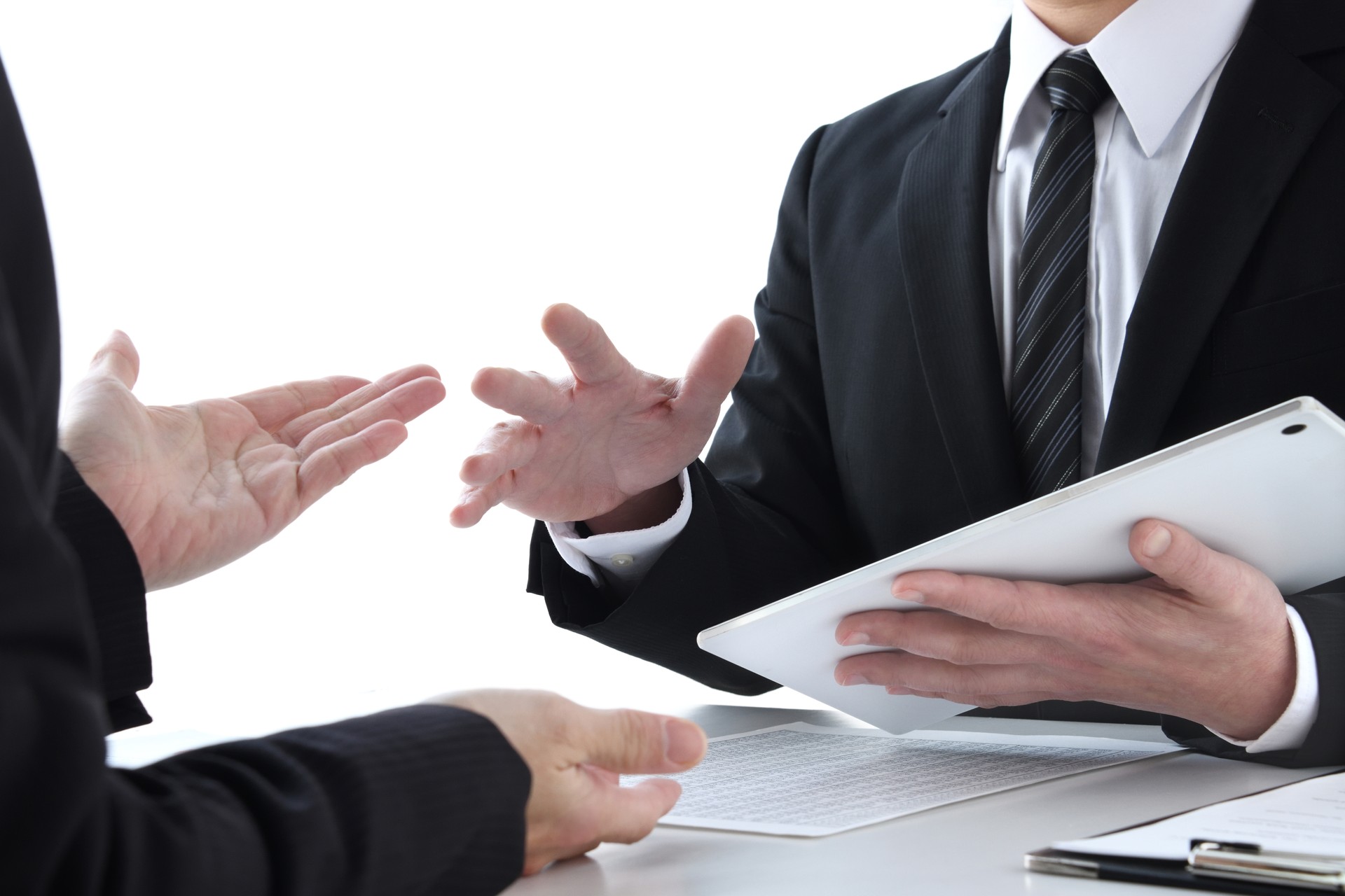 Business man speaking in meeting